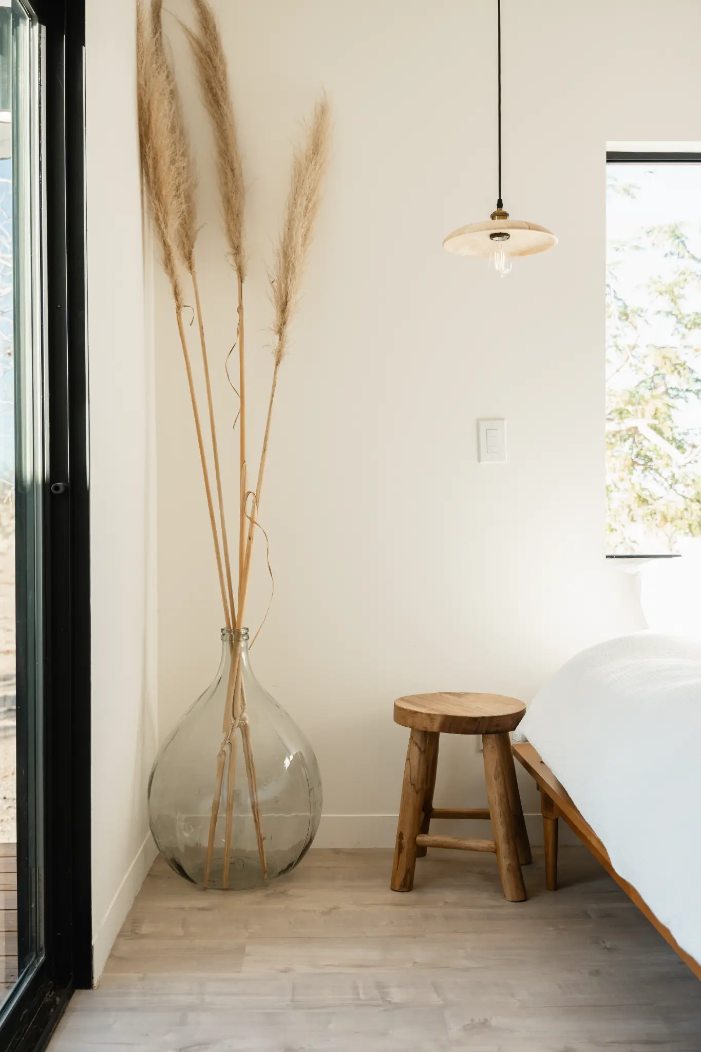 Bedroom with curated art and warm desert light